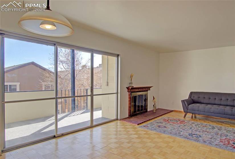 Living area featuring light parquet flooring