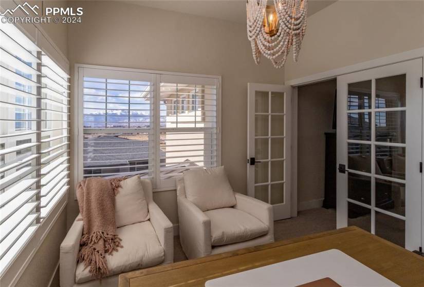 Bonus/flex room that could be used as sitting/office/exercise/vanity/dressing/nursery/den area off the master bedroom featuring french doors, tons of natural light and the most perfect view of the mountains