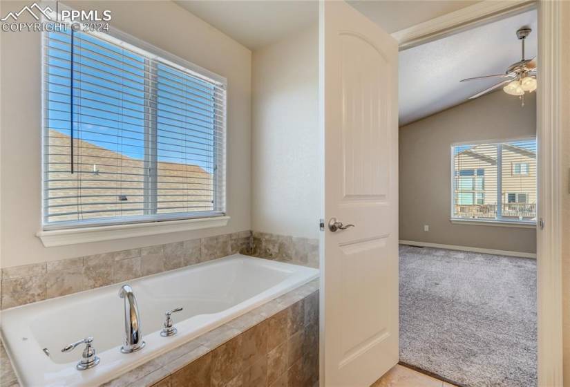 Relax and Unwind in Soaking Tub with Tile Surround