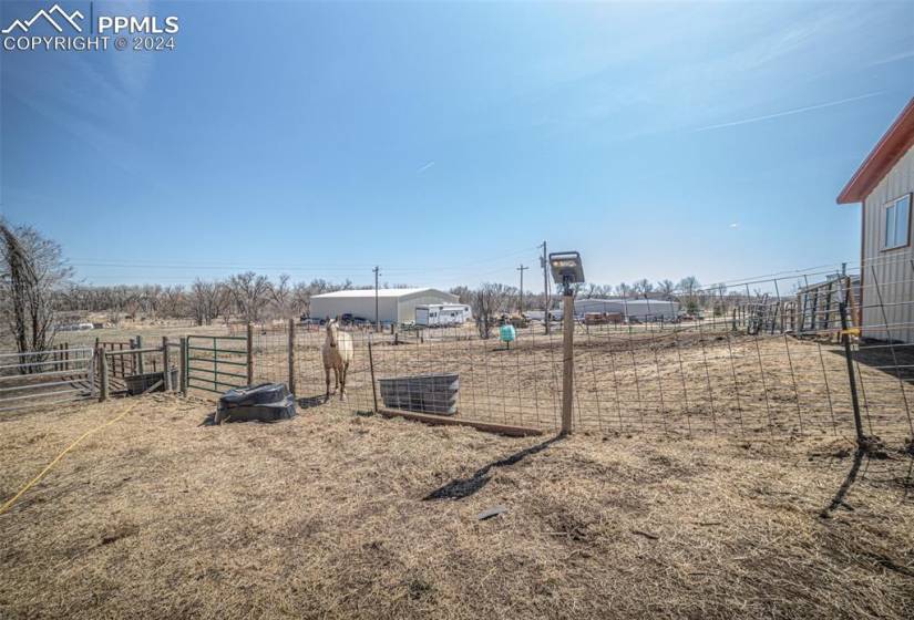 View of yard with a rural view