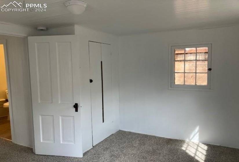 Front bedroom with easy access to the full bath and walk=in closet.