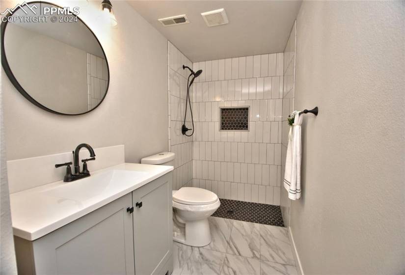 Bathroom featuring New vanity and Custom shower