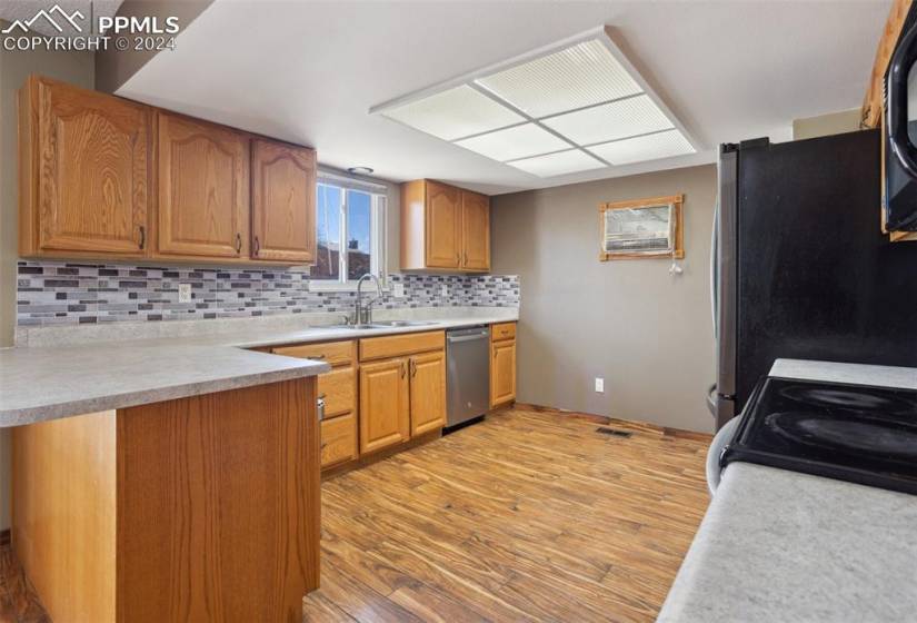 Kitchen featuring appliances with stainless steel finishes,
