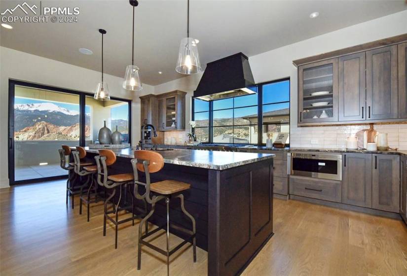 What Chef wouldn't like to use this Kitchen with custom cabinetry, stone counters, and Breathtaking Views