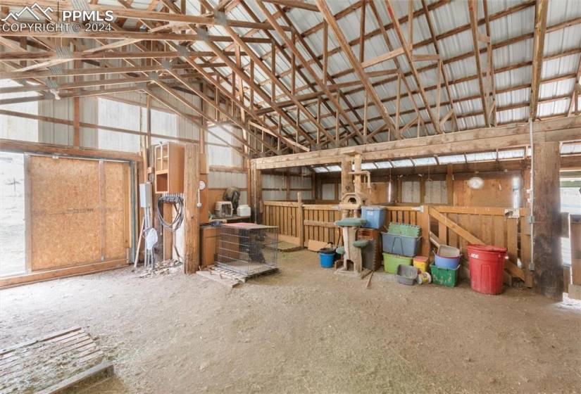 Inside of barn w tack room and hay storage, power and water.