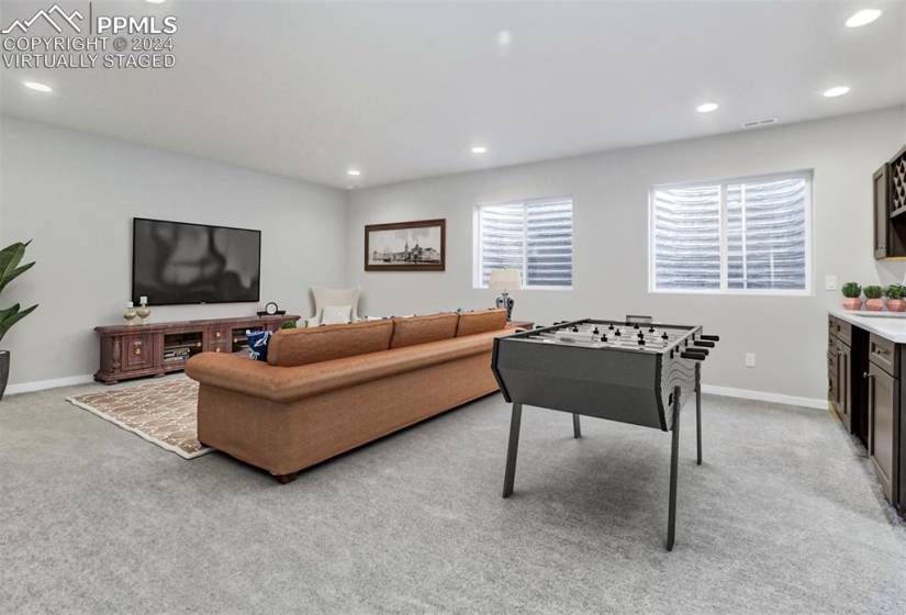 Virtually staged basement Recreation room