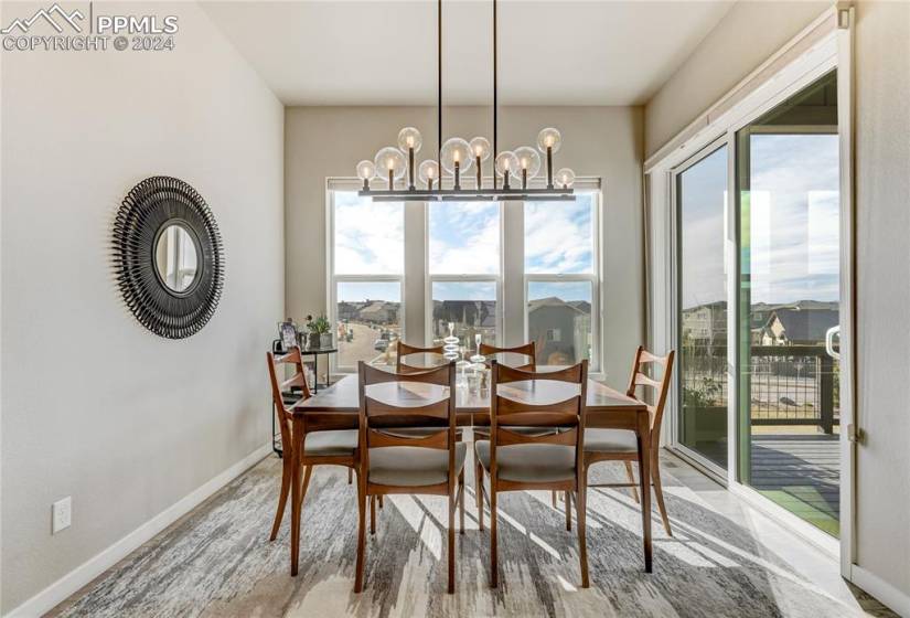Spacious Dining with Walk-Out to Rear, Covered Composite Deck with Tongue + Groove Ceiling