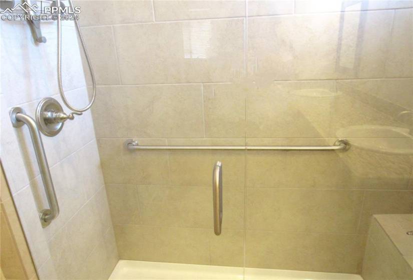 Master bathroom with tiled shower