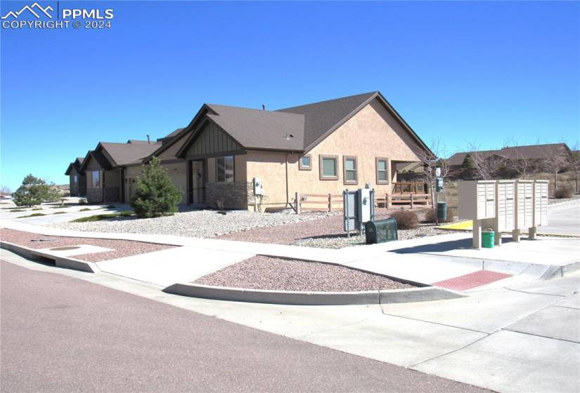 View of front of home. Located close to mailbox, pet station and guest parking