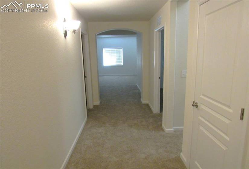 Basement corridor. Carpeted