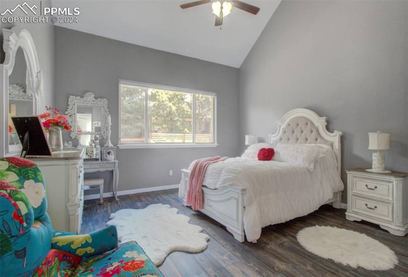 Spacious Primary bedroom with LVP flooring and plenty of natural light!