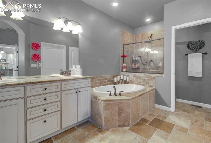 5 piece Primary bathroom with large walk in closet and granite counter tops!