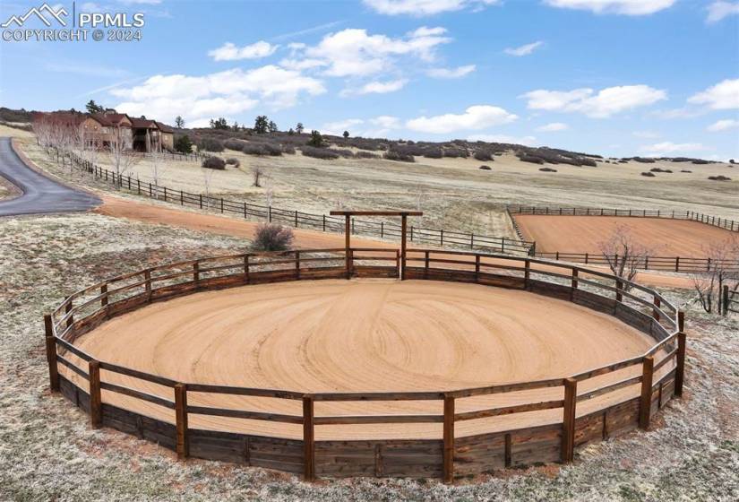 Round pen with siding.