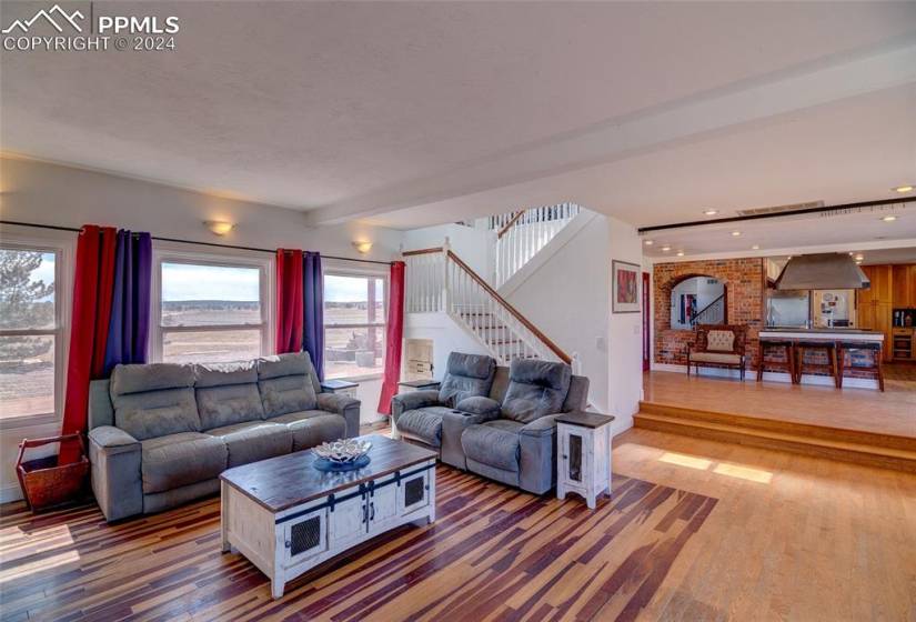Family room featuring dark hardwood / wood-style floors and plenty of natural light.