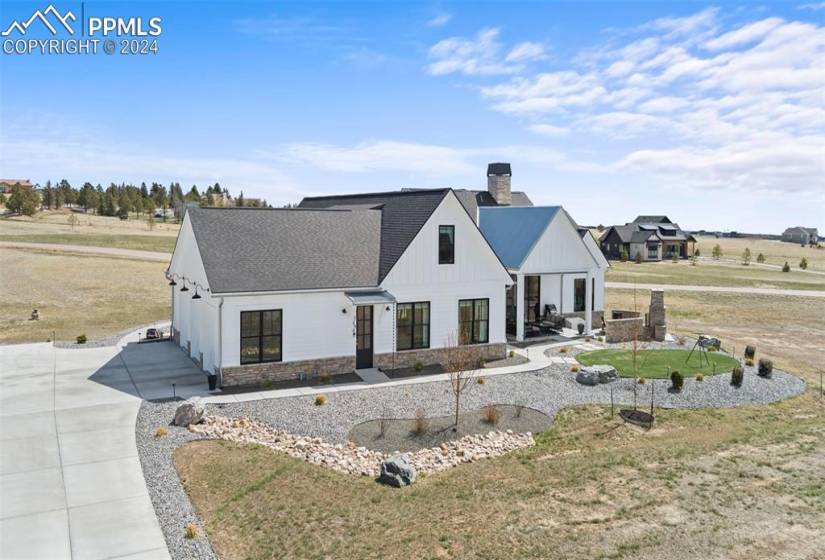 View of modern farmhouse style home