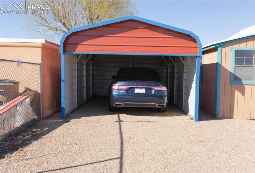 View of car parking with a carport