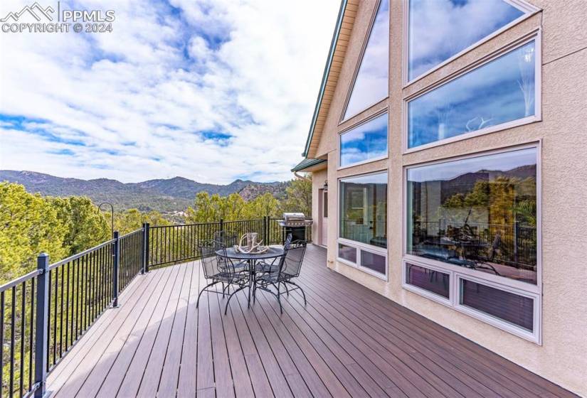 Deck featuring a mountain view and grilling area