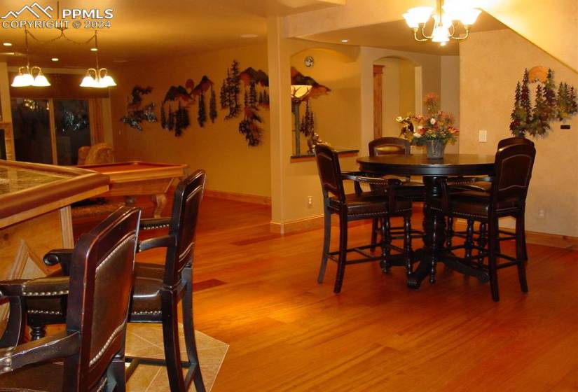 Dining room featuring a chandelier and light hardwood / wood-style flooring