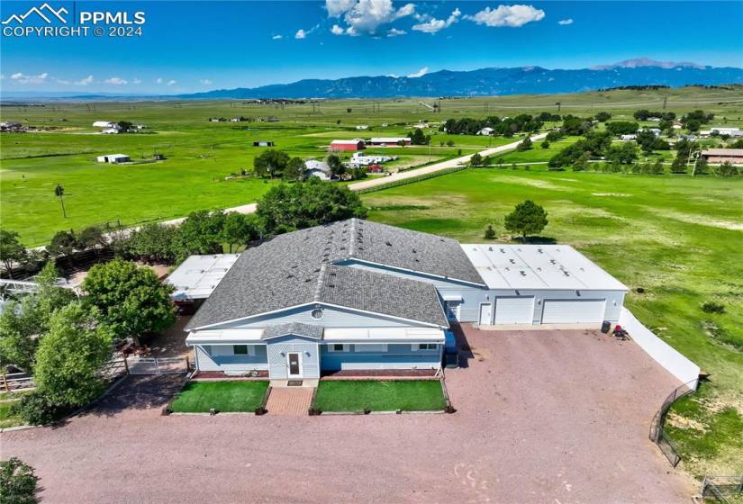 Birds eye view of property with a mountain view