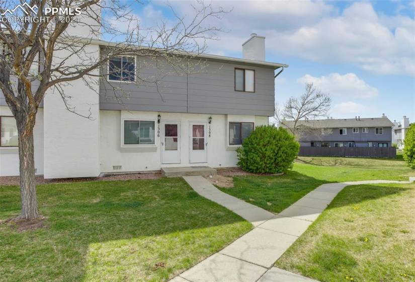 View of front of house with a front lawn