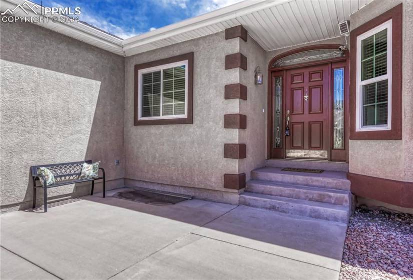 Front exterior Entry with large patio to enjoy the Colorado sunshine.