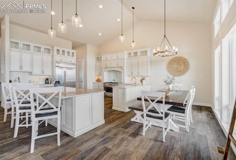 Eat-in dining area offers space for family & guests, yet open to the rest of the home.