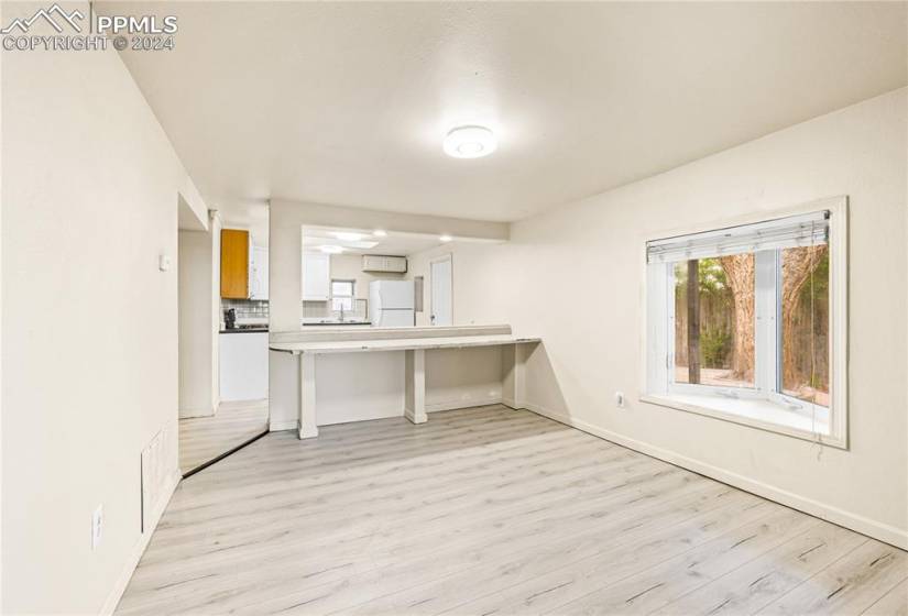 Unfurnished living room featuring light hardwood / wood-style floors