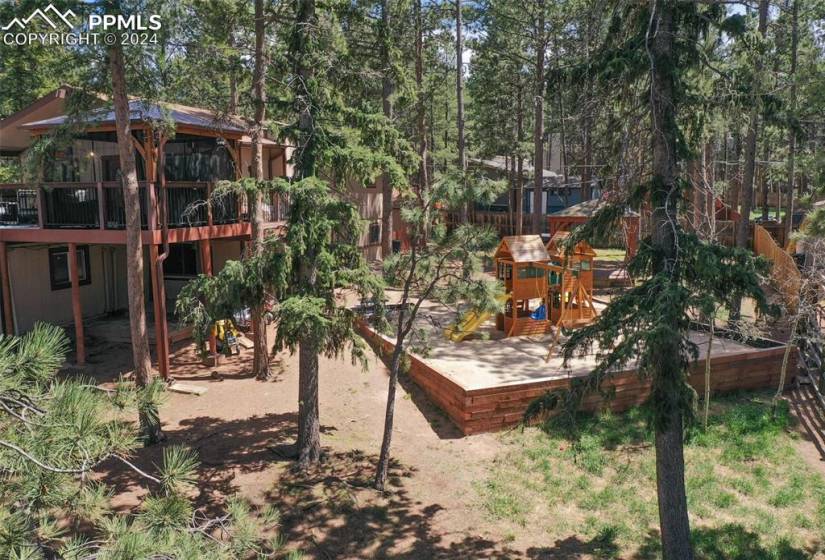 View of yard featuring a wooden deck