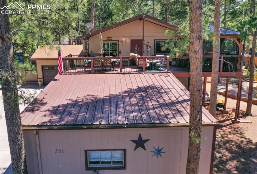 Deck featuring a garage