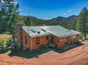 View of front of house featuring a mountain view