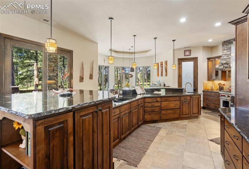 Kitchen with raised counter bar in island